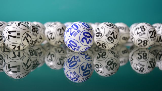 White balls with numbers printed on them.  